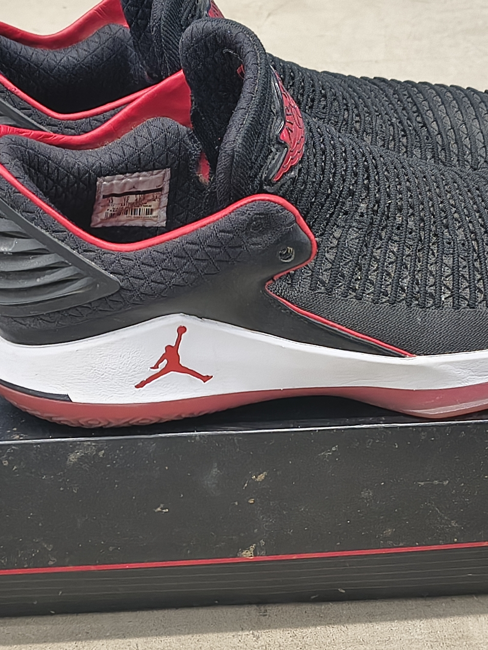 Air Jordan Low-Top Sneakers in Black & Red